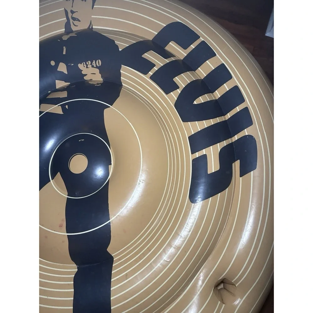 The King Of Rock And Roll Pool Float. Shaped like a vintage 45 RPM vinyl record.